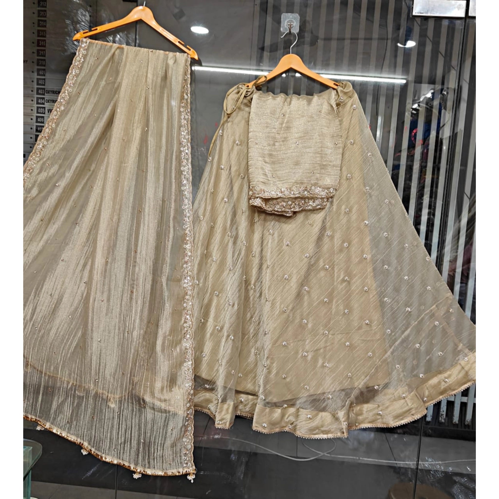 Elegant Champagne Banarasi Crush Tissue Silk Lehenga Set